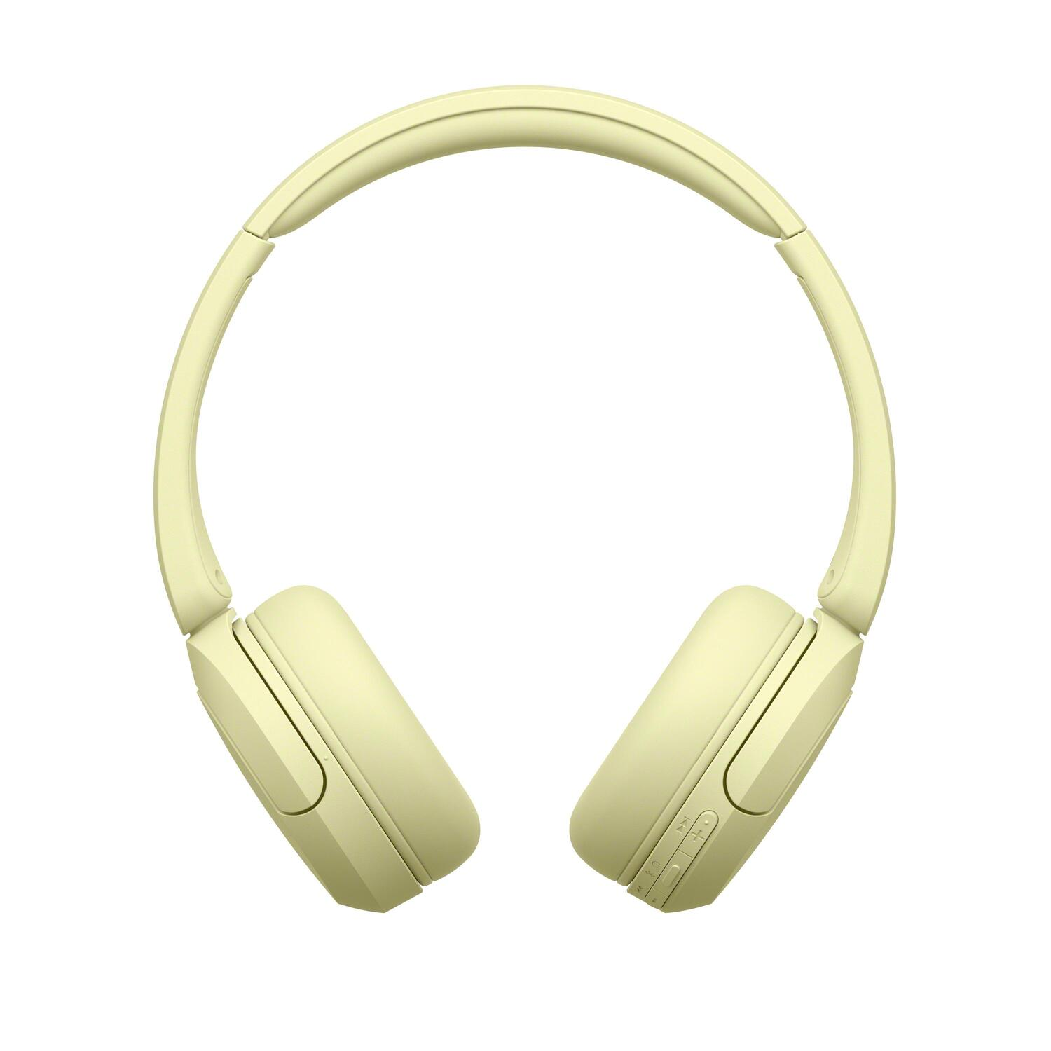 Casque circum-auriculaire de couleur jaune clair.