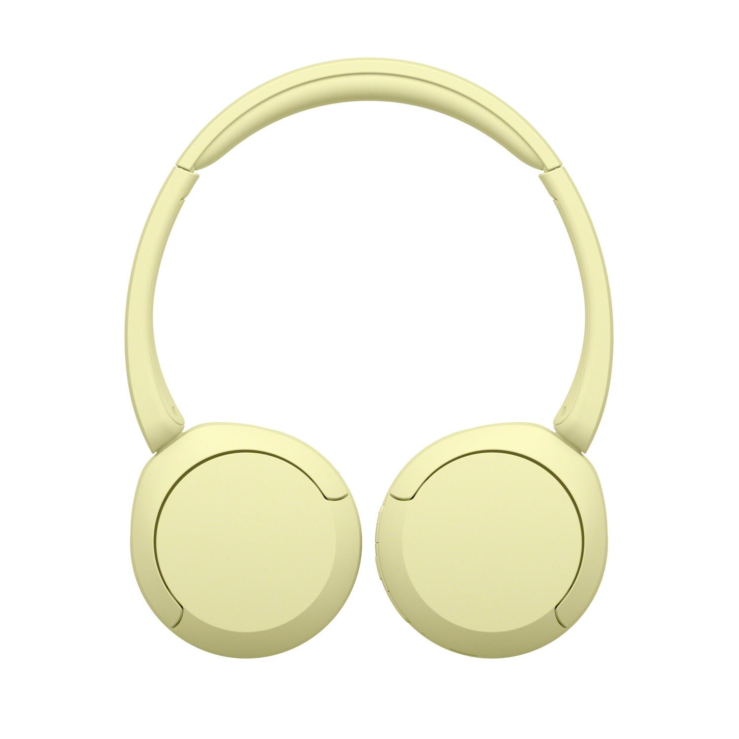 Casque jaune, vue de dessus, avec un design lisse et épuré sur fond blanc.