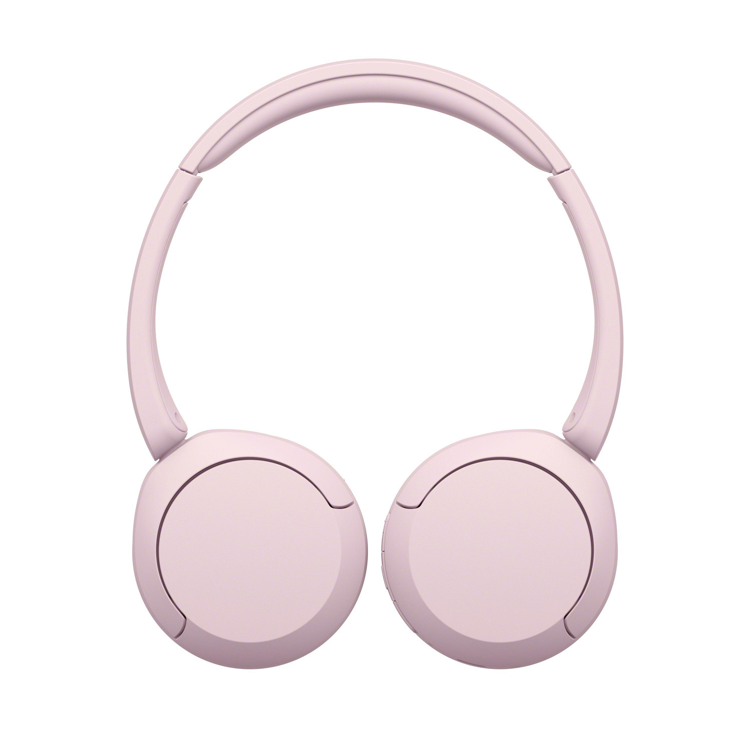 Casque rose, vue de dessus. Les oreillettes et le bandeau sont visibles.