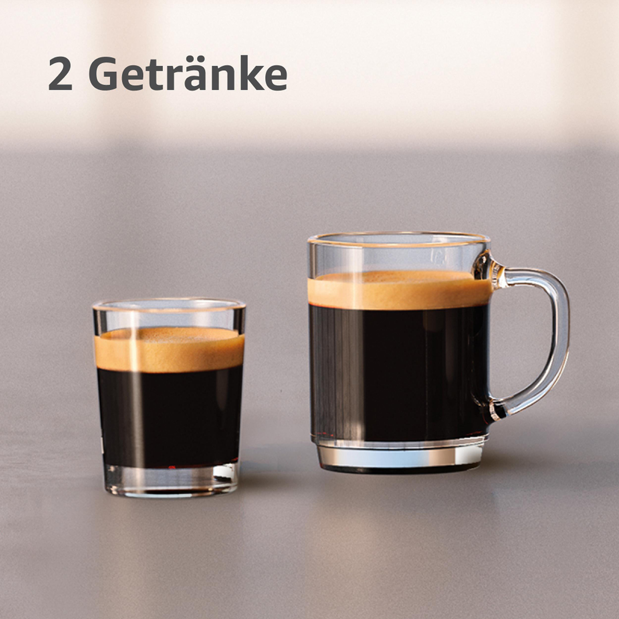 Zwei Kaffeegläser, ein Shot und ein Becher, auf grauem Hintergrund.