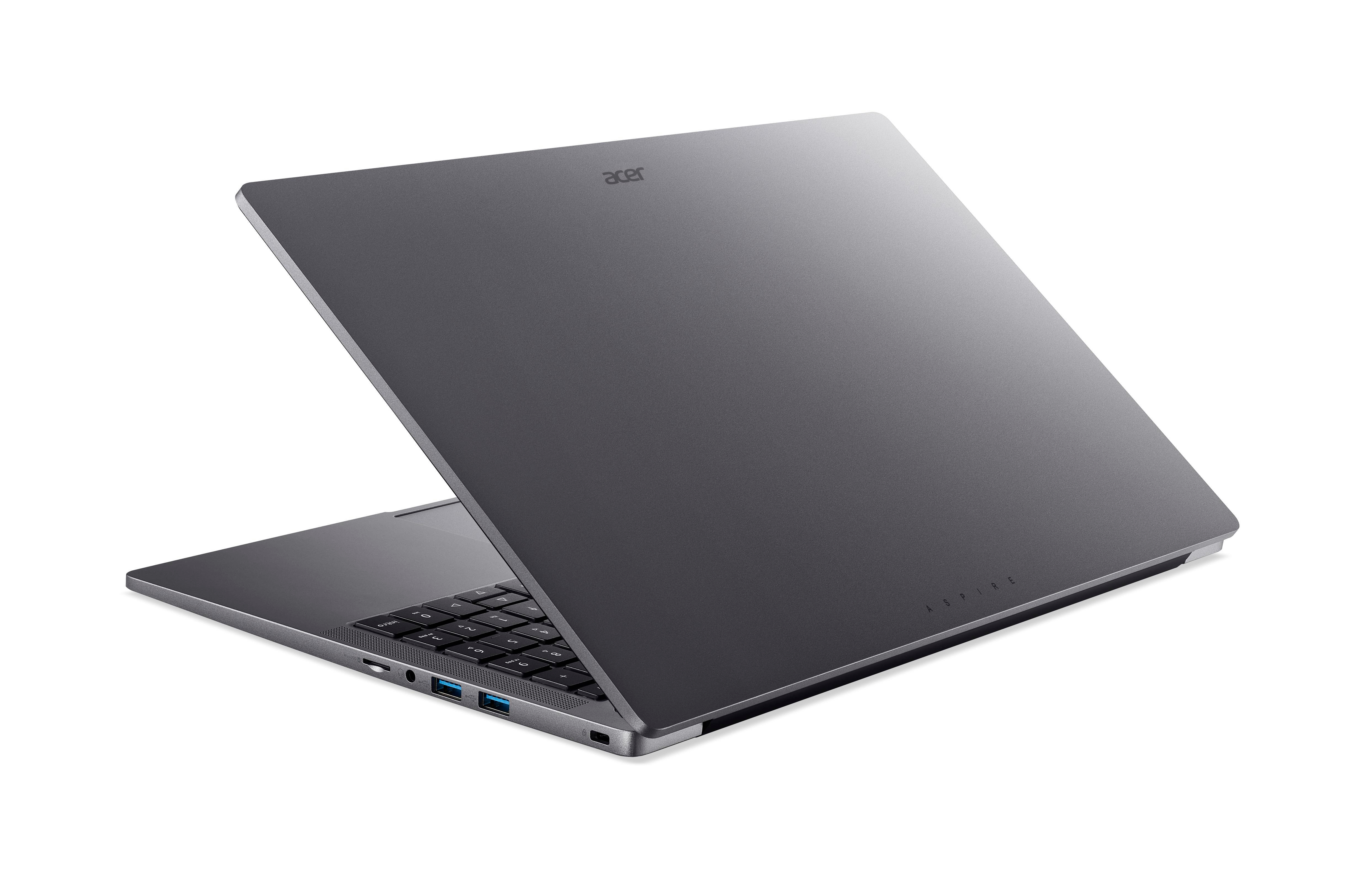 Grauer Acer Laptop, schräge Ansicht. Deckel offen, schwarze Tastatur sichtbar. Weißer Hintergrund. Acer Logo sichtbar.