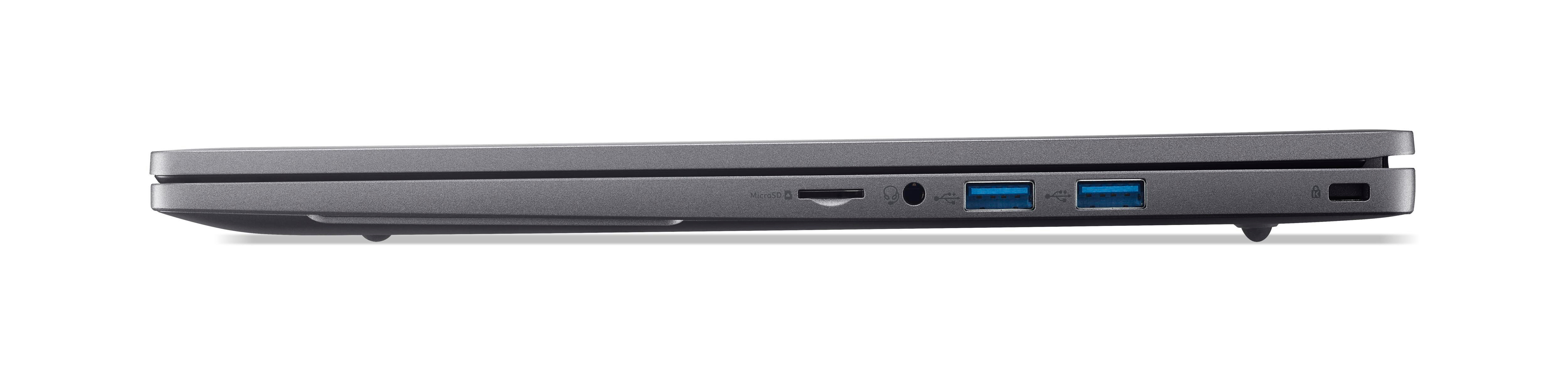 Seitenansicht eines grauen Laptops mit Anschlüssen und Verbindungen vor weißem Hintergrund mit Schatten.