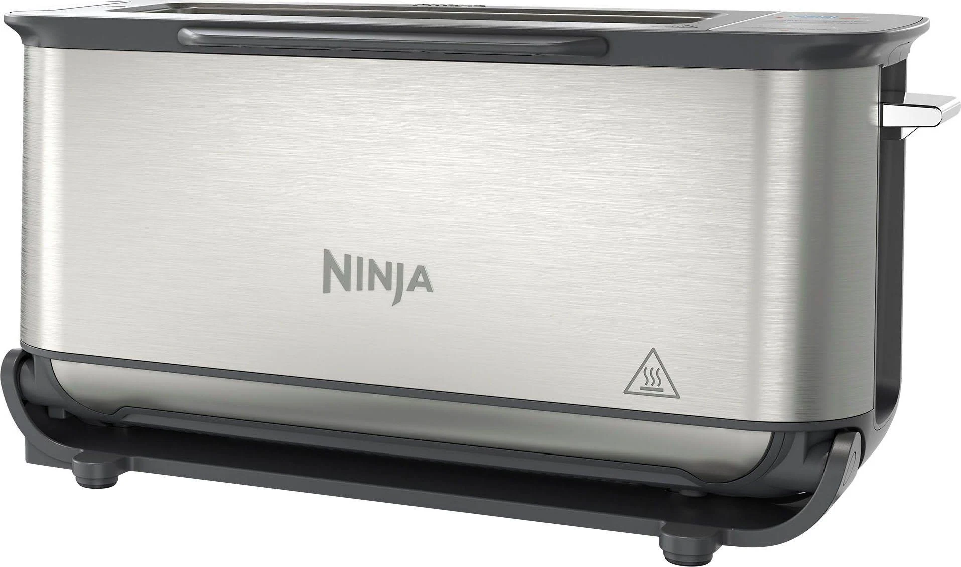 Una tostadora Ninja plateada con base negra. El logo de Ninja está en el frente. Un símbolo de advertencia está en la parte inferior.