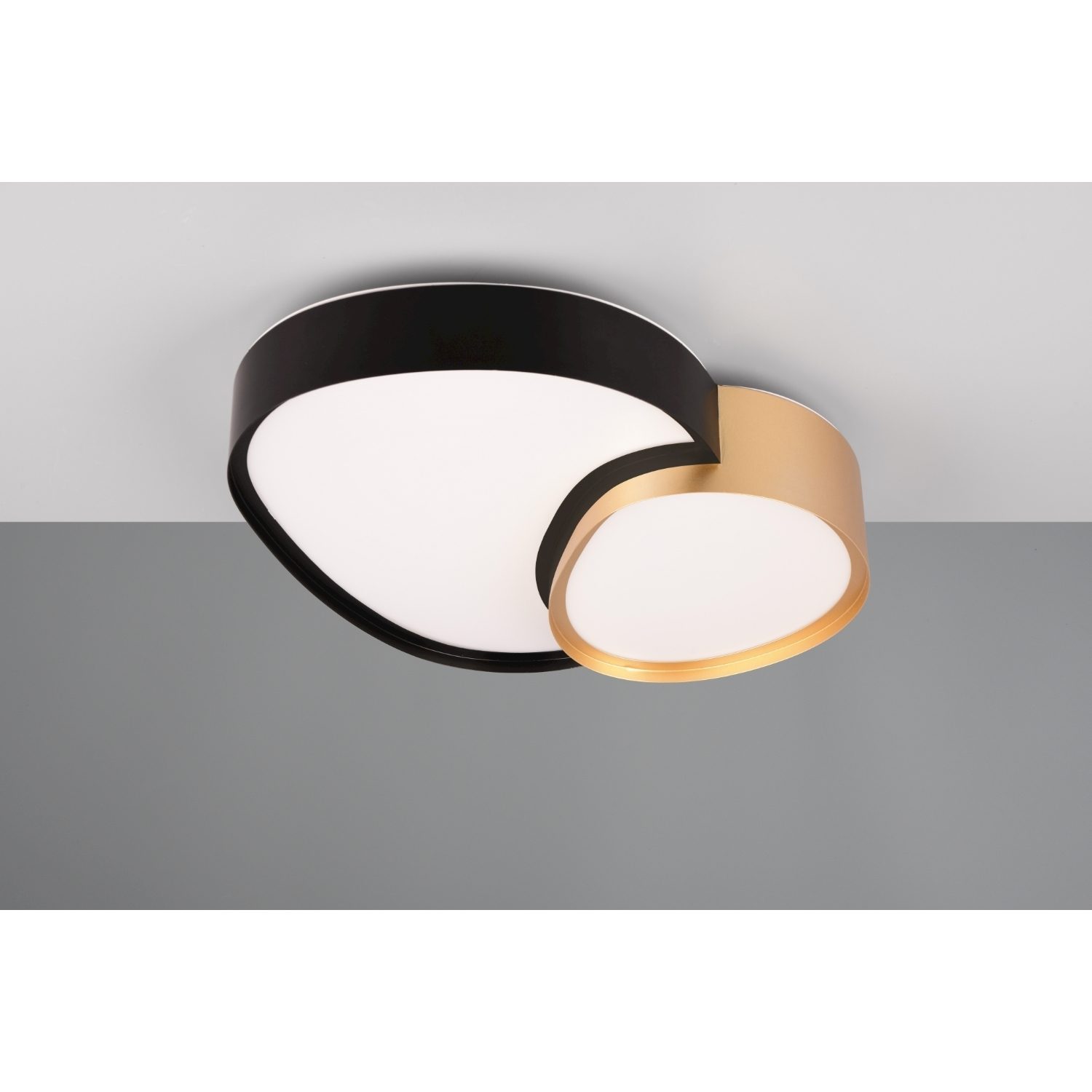 Lampada da soffitto, nera e oro, con due sezioni sovrapposte.