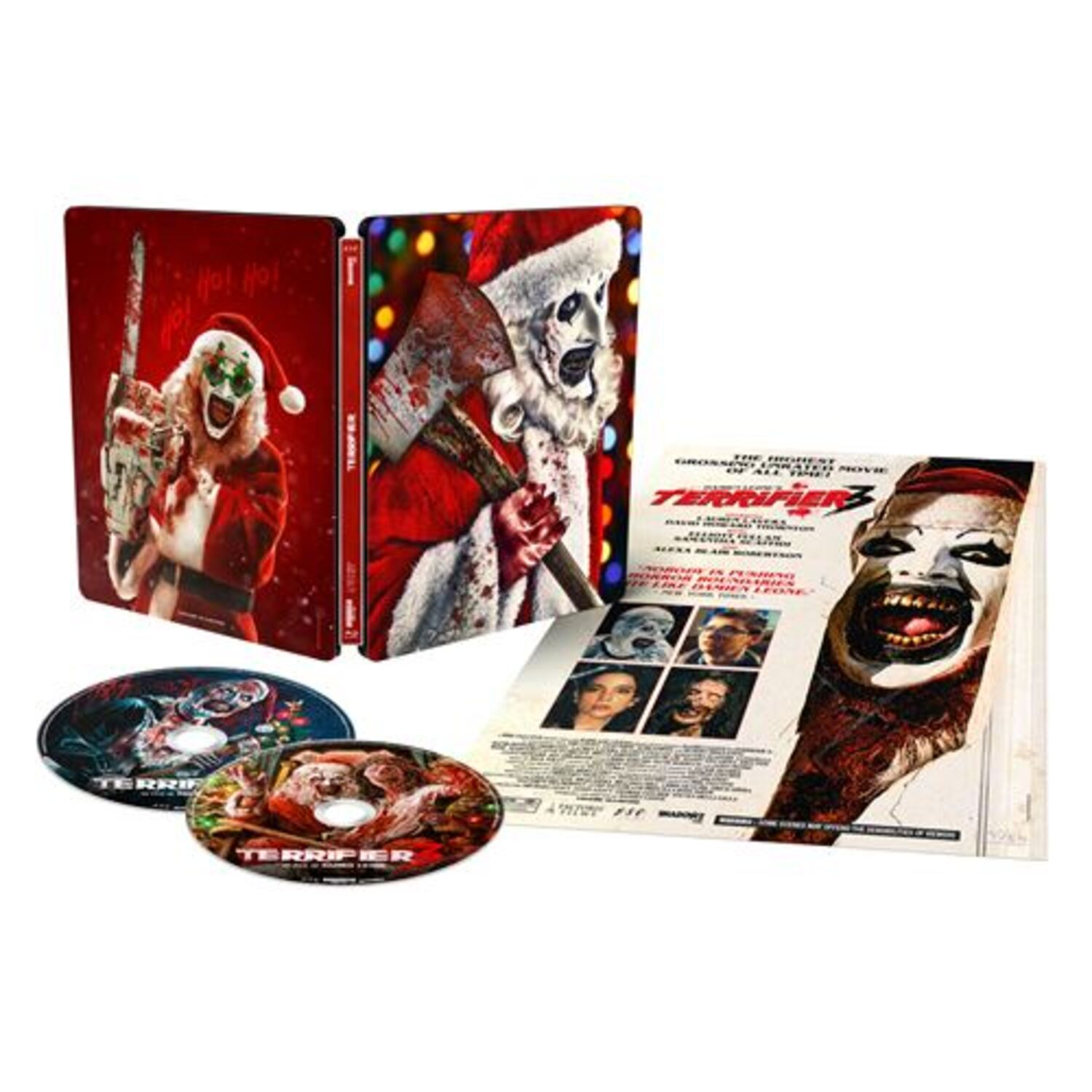 Une couverture de film d'horreur. Père Noël avec une hache sur la couverture. Deux disques et des imprimés sont inclus.