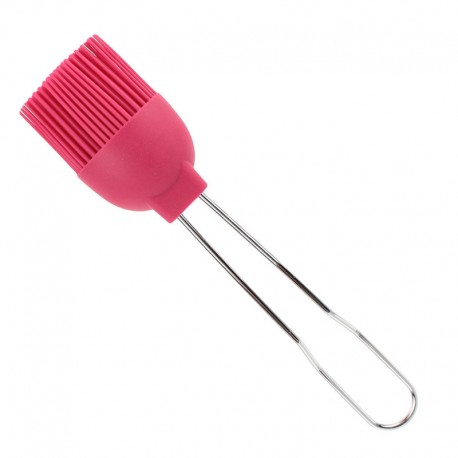 Brocha de silicona rosa. Cerdas y mango visibles, aislado sobre blanco.