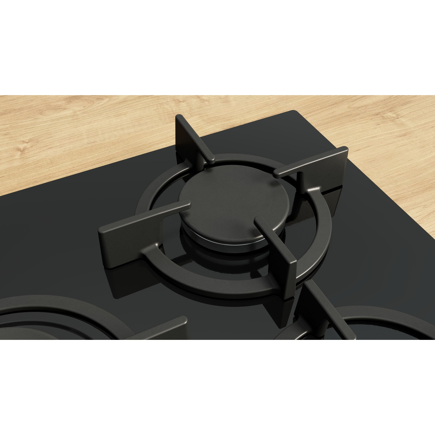 Primo piano di un piano cottura nero con quattro bruciatori e una superficie in legno.