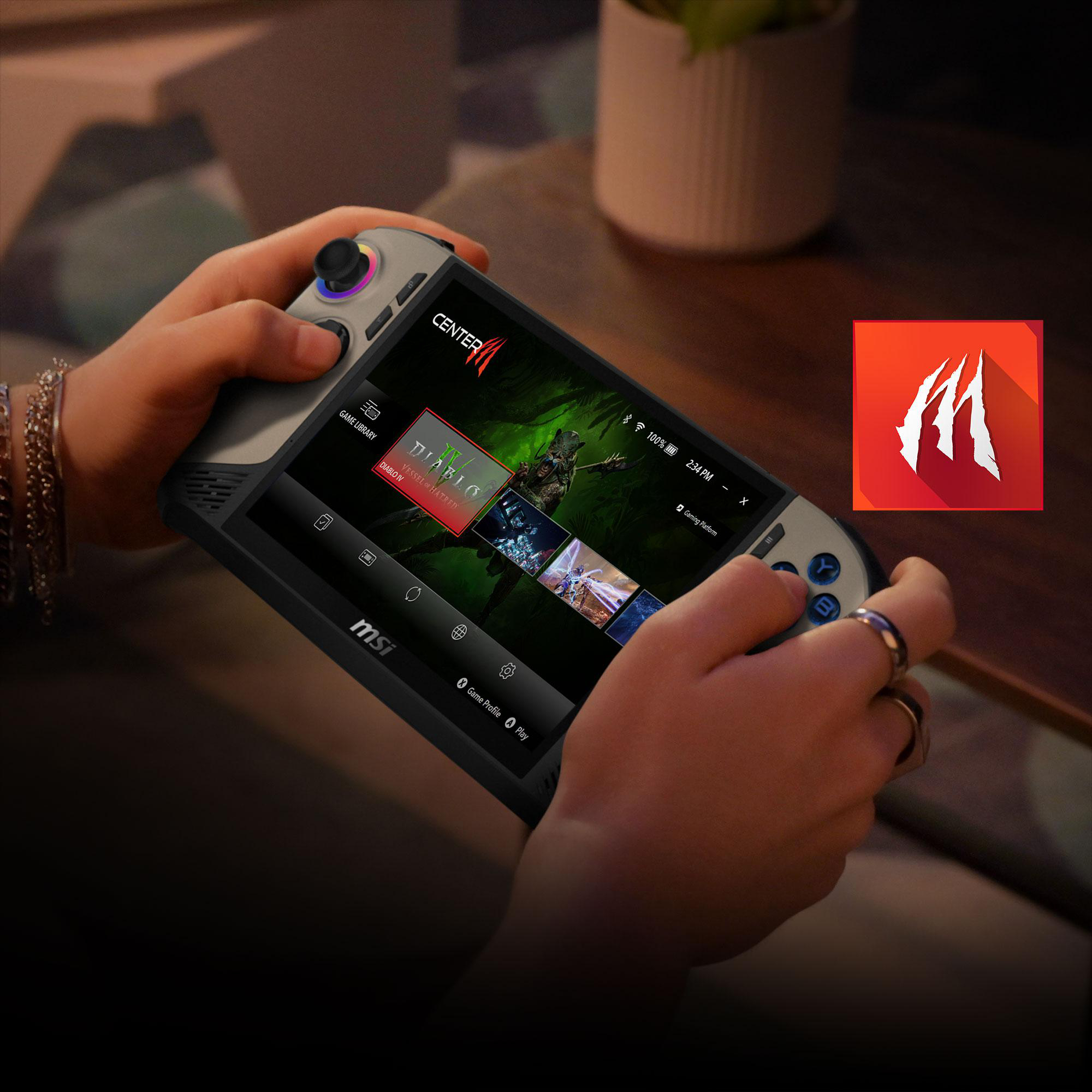 Hände, die ein tragbares Gaming-Gerät halten, auf dem das Spiel 'Diablo' angezeigt wird.