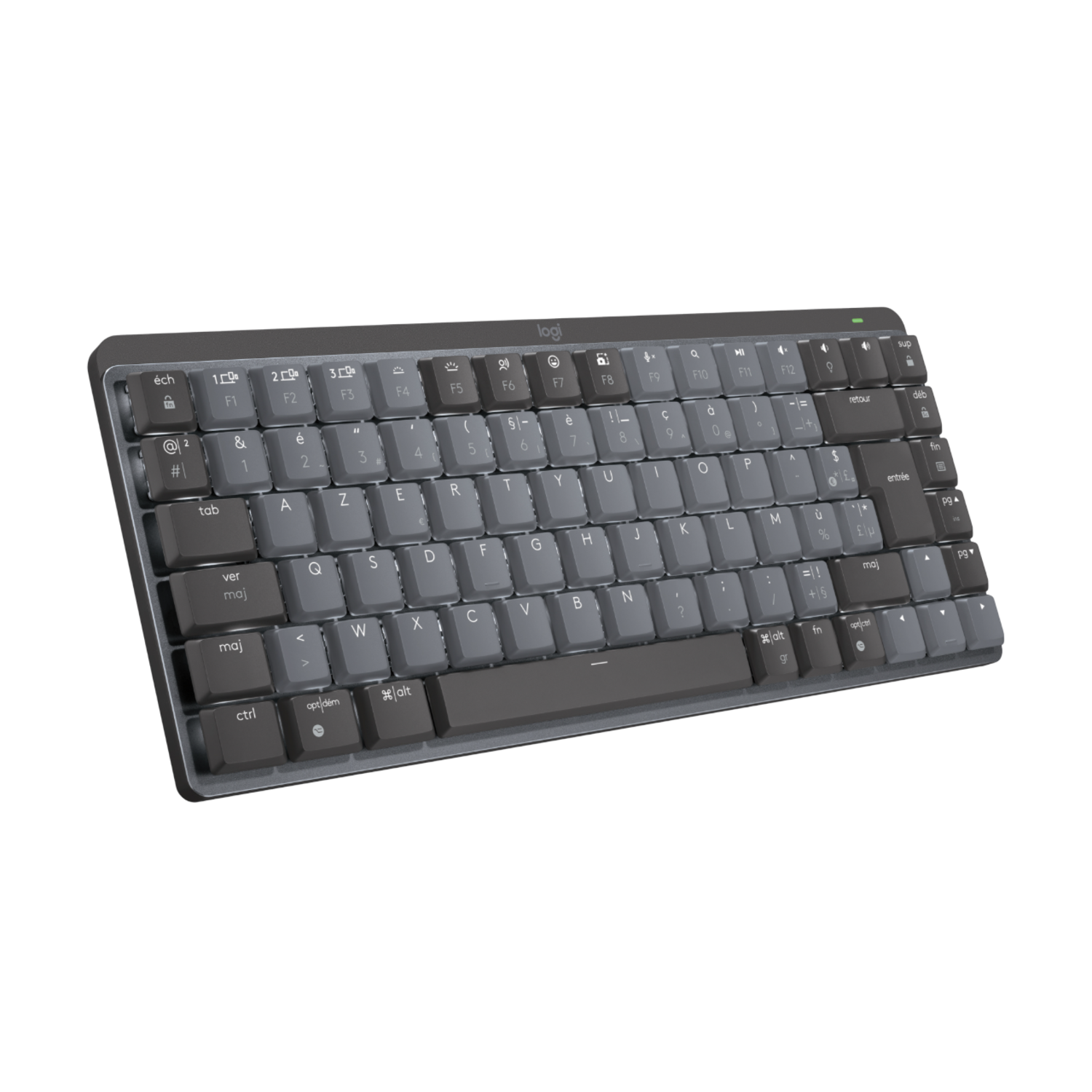 Un clavier sans fil gris avec des touches noires et des lettres blanches sur une surface sombre.