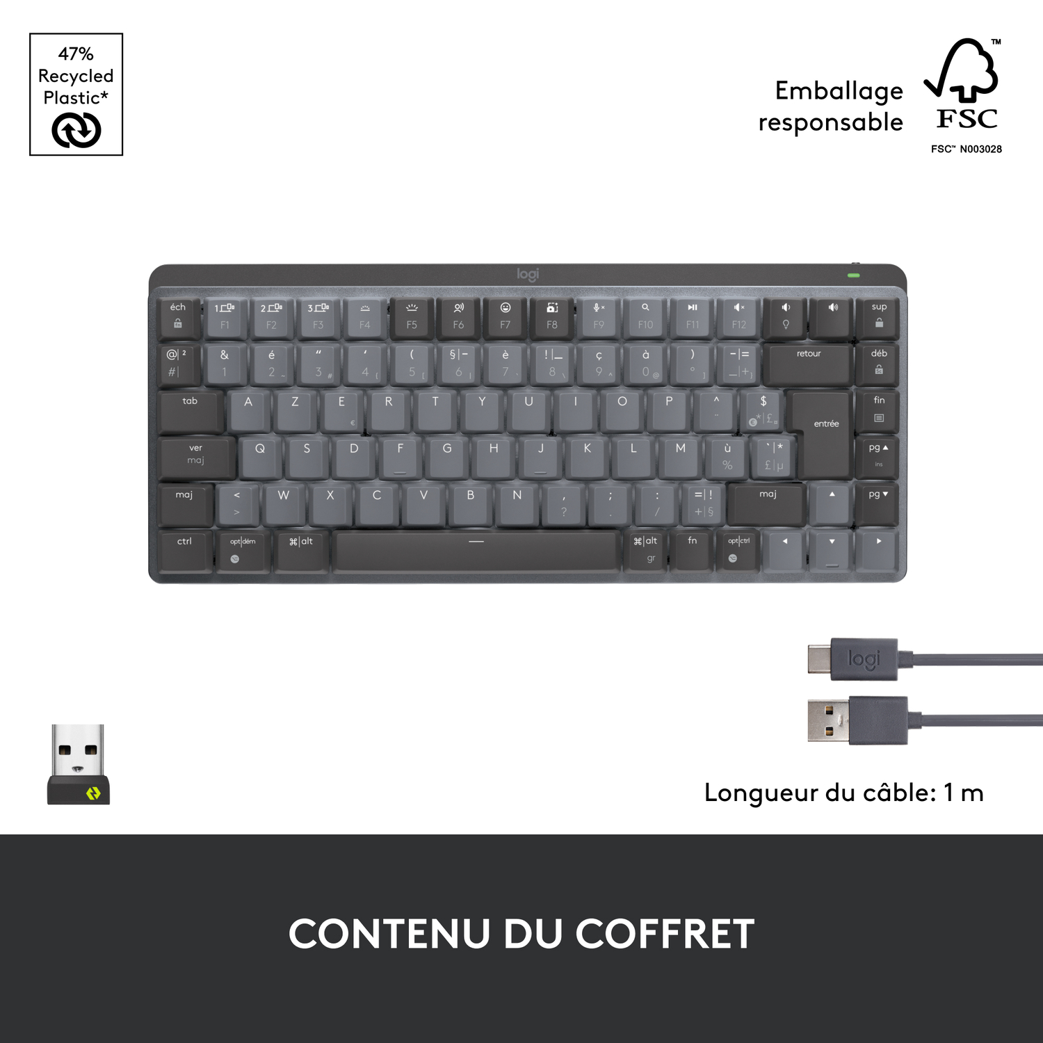 Clavier gris compact avec câble USB-C et adaptateur sans fil, avec détails d'emballage.