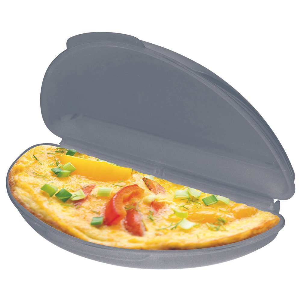 Un fabricante de tortillas gris, abierto, que contiene una tortilla con ingredientes.