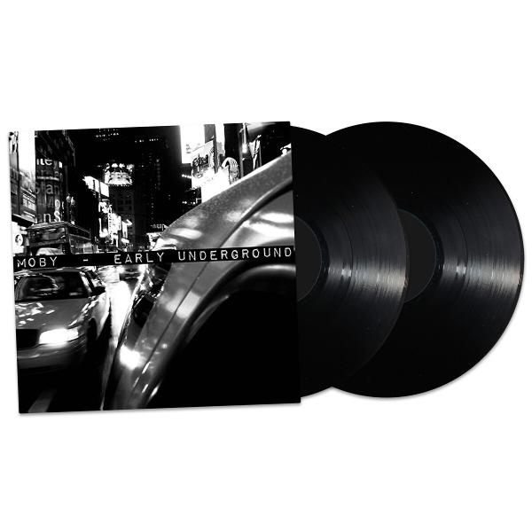 Albumcover: Schwarz-Weiß-Bild einer Stadtstraße mit Autos.