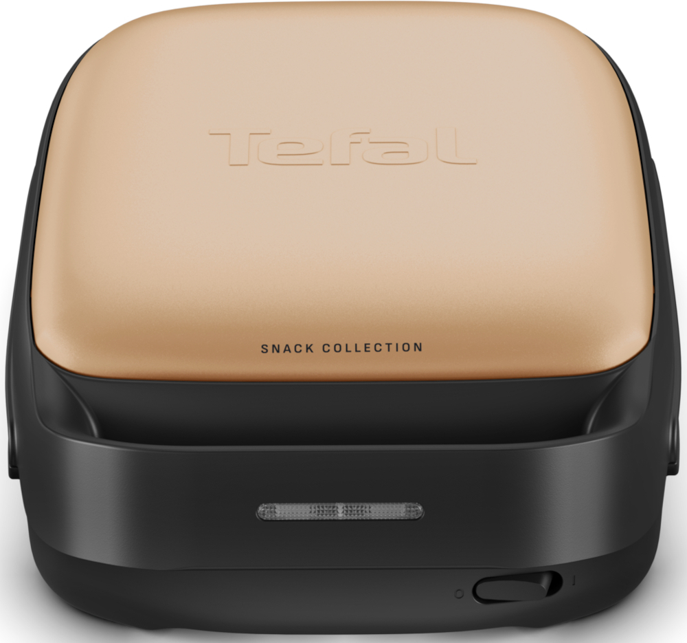 Tefal Snack Collection apparaat, gesloten. Het is zwart met een bronzen bovenkant.