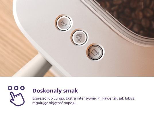 Panel sterowania ekspresu do kawy z trzema przyciskami i ziarnami kawy obok.