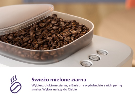 Ziarna kawy w przezroczystym pojemniku. Tekst: Świeżo mielone ziarna.