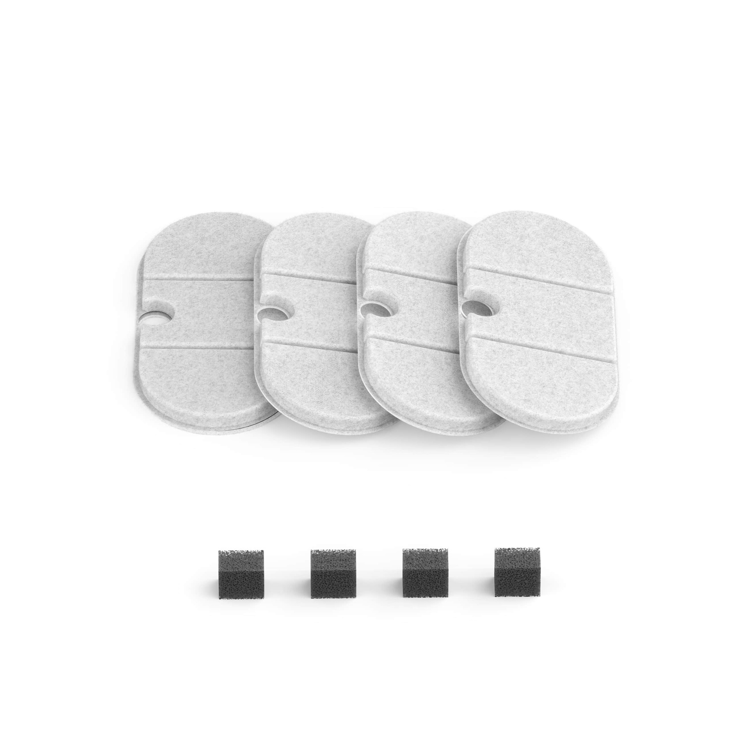 Four white, oval-shaped air filter replacements and four small black foam pieces.
