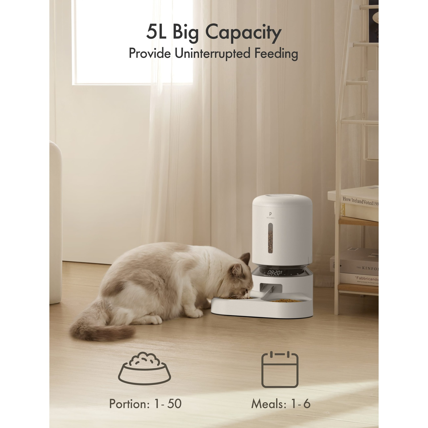 A cat eating from an automatic feeder with a 5L capacity.