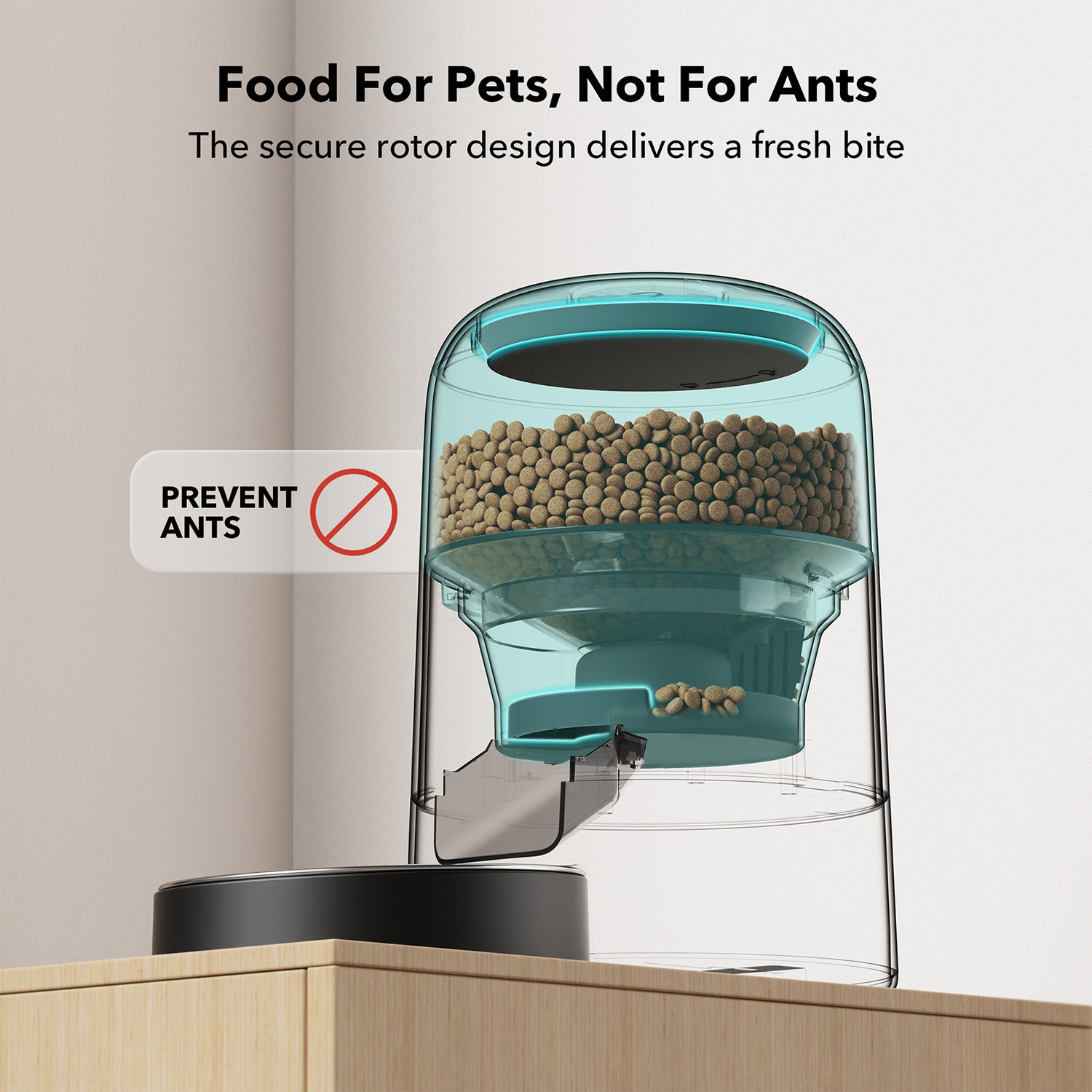 A pet food dispenser with a clear container of food, design to prevent ants.