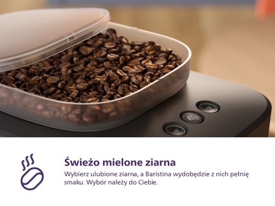 Ziarna kawy w przezroczystym pojemniku na urządzeniu, z tekstem o świeżo zmielonych ziarnach.