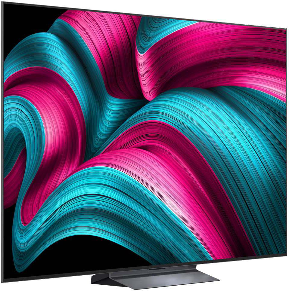 Großer TV-Bildschirm mit abstraktem blauem und rosa Design. Ständer unten. Schwarzer Hintergrund.