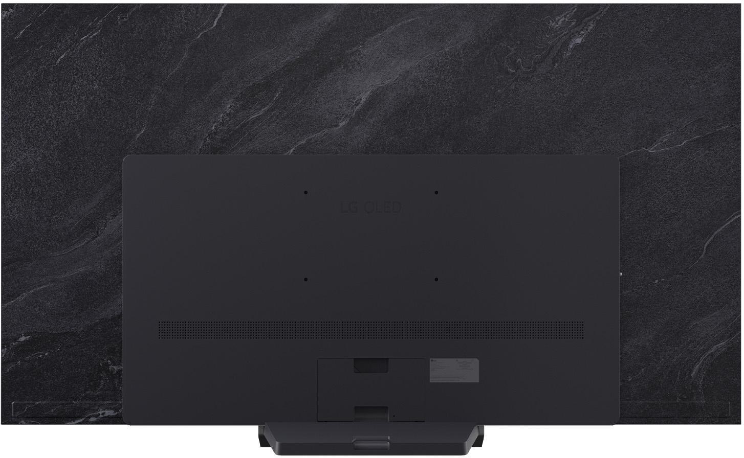 Rückseite des schwarzen LG OLED-Fernsehers auf strukturiertem grauen Hintergrund.