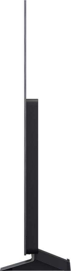 Ein schlanker, schwarzer Fernseher mit minimalistischem Standfuß, von der Seite gesehen.