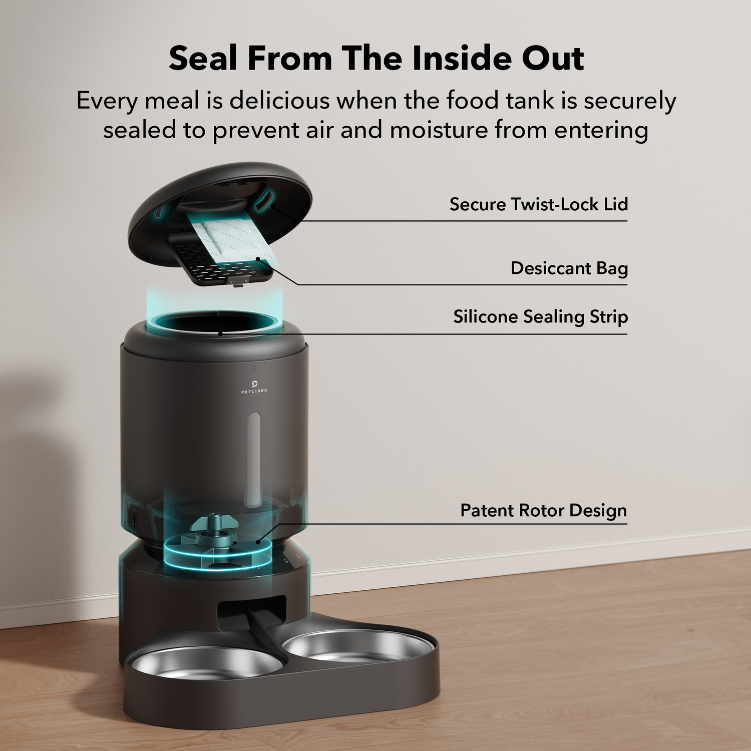Black pet food dispenser, cutaway shows lid, desiccant bag, and food compartment.