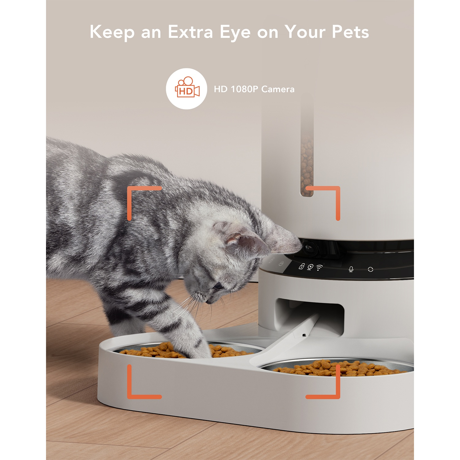 A cat eating from a food bowl. A smart pet feeder is to the right.