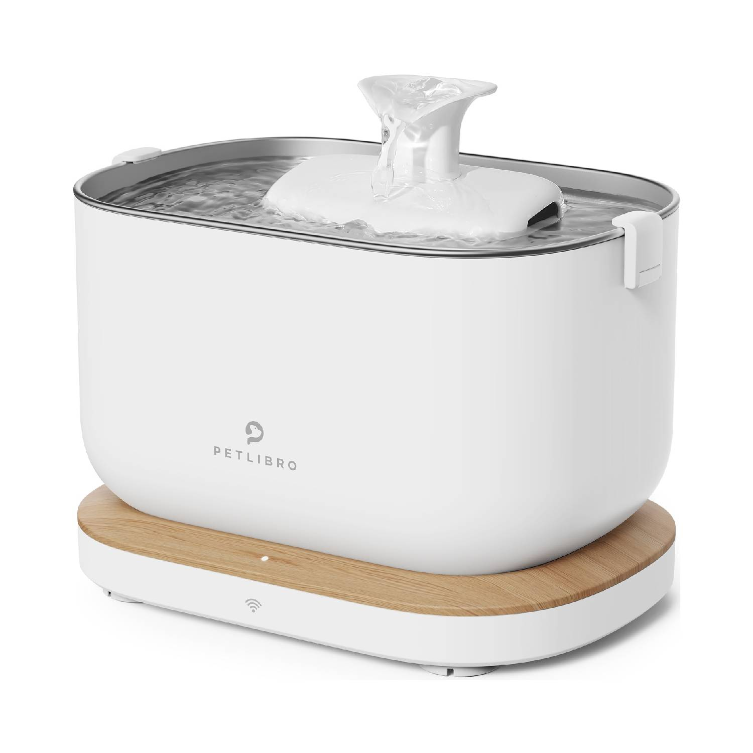 White pet water fountain on a wooden base, with a water stream coming out.