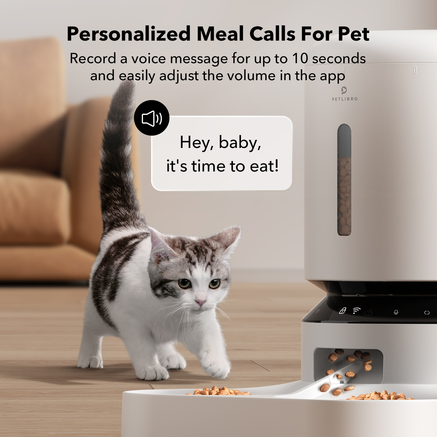 A cat approaching a food dispenser with a message: "Hey, baby, it's time to eat!".