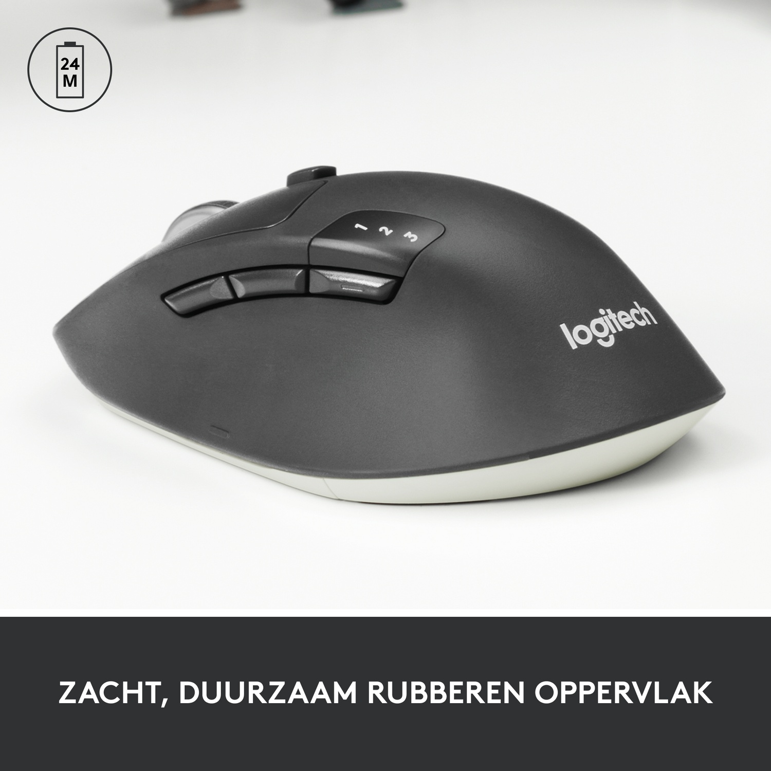 A black mouse with buttons and a white base is seen on a white surface. Text is below.