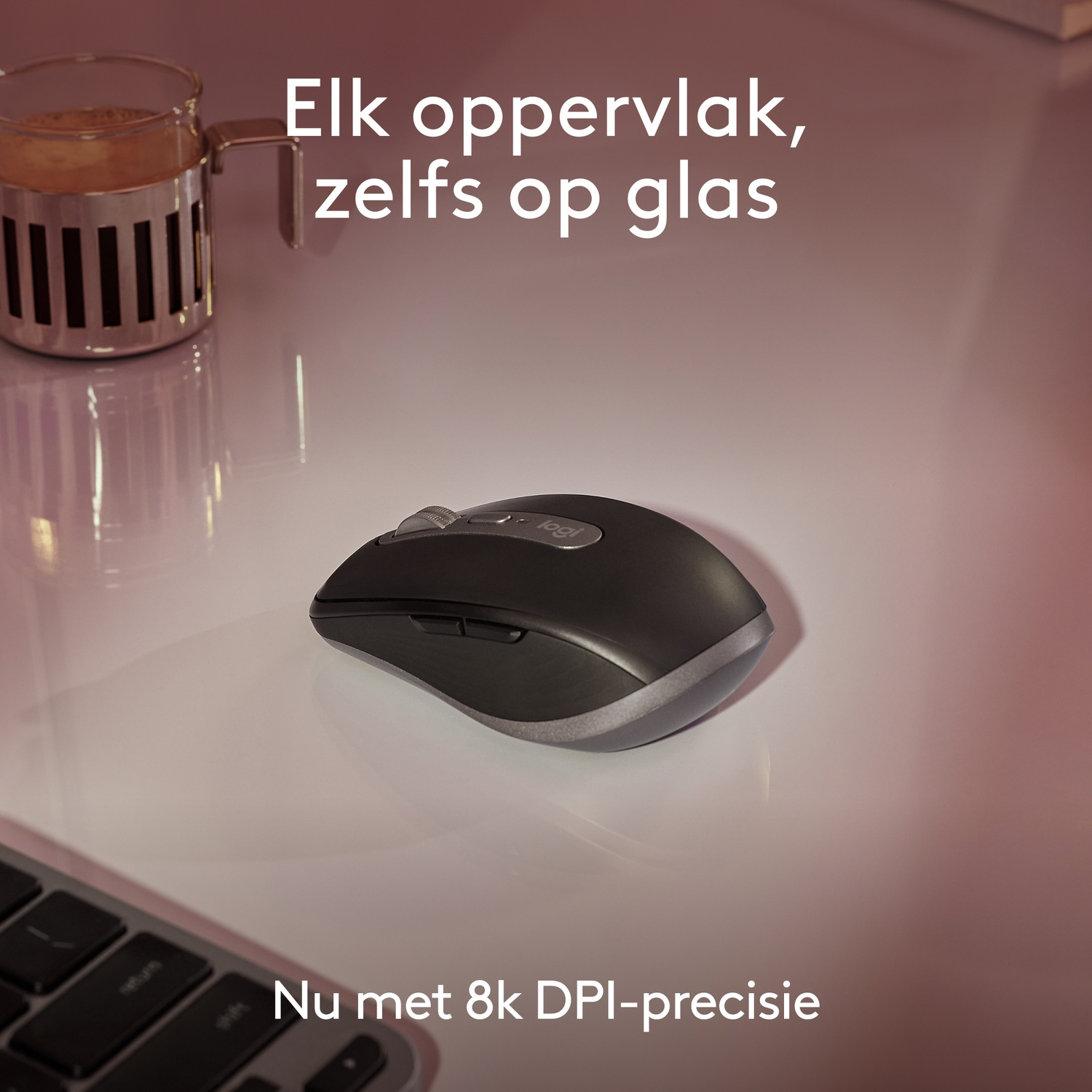 Black mouse on a white surface, with text about precision.