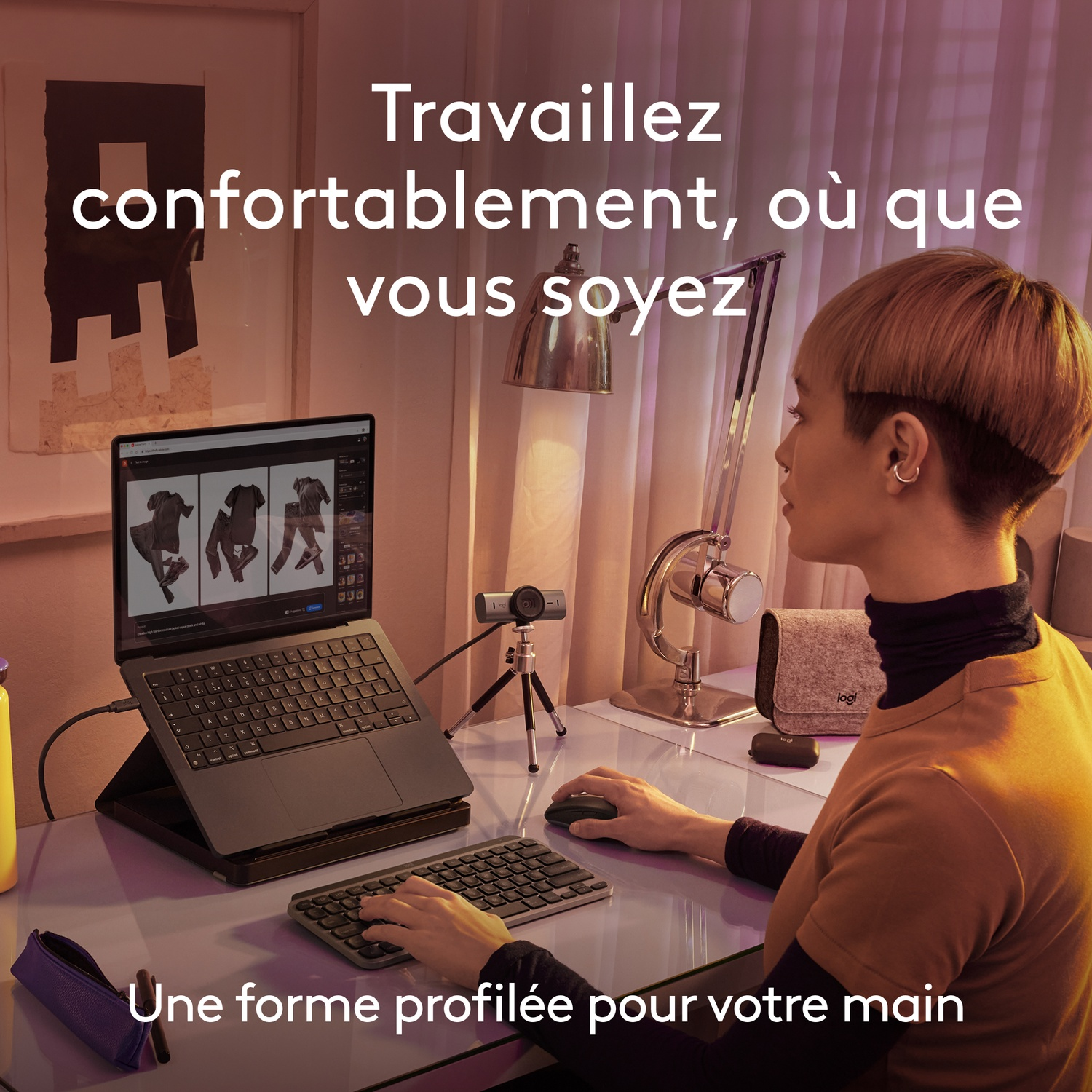 Personne travaillant sur un ordinateur portable avec clavier et souris sur un bureau.