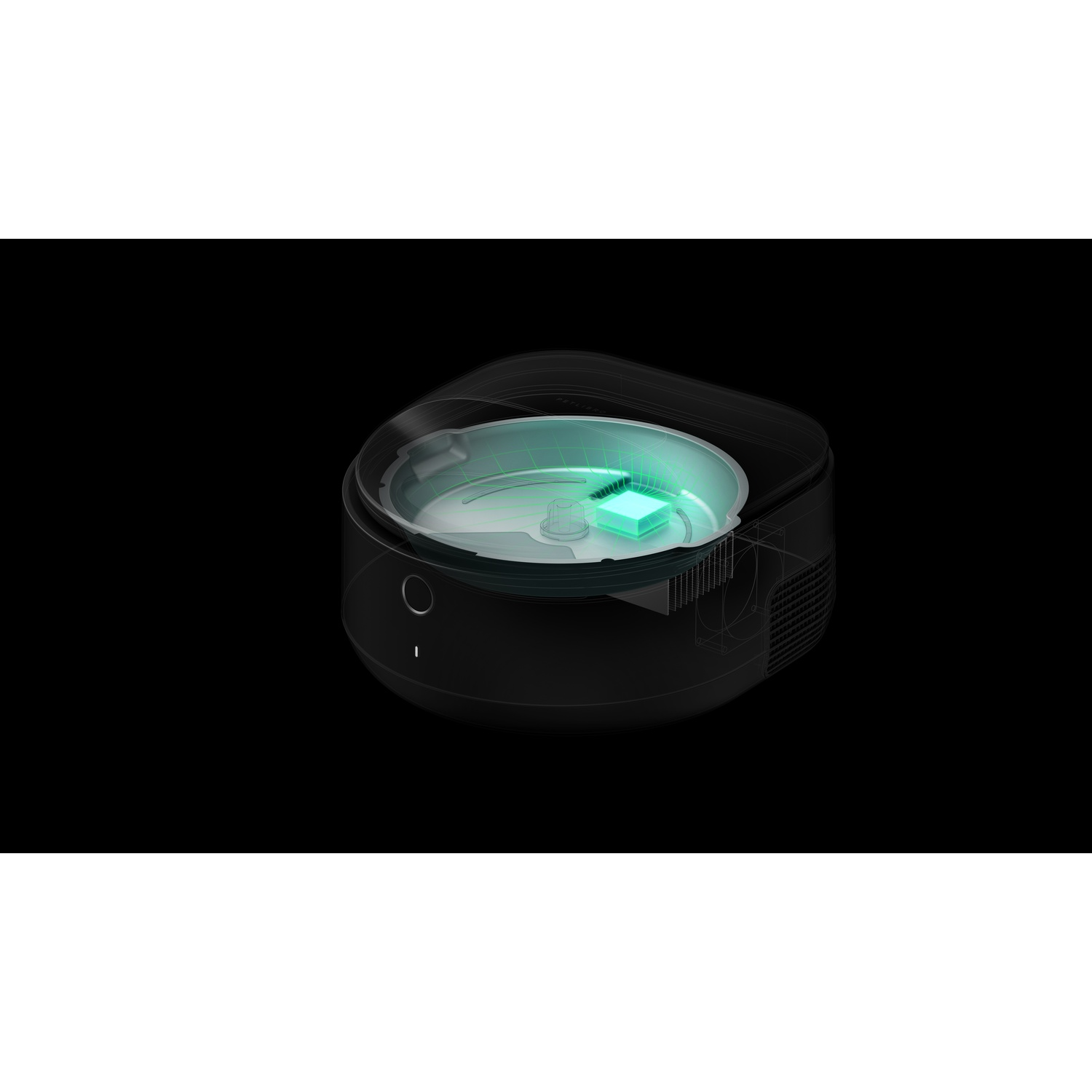 Black device with a transparent top, a green interior, and a black background.