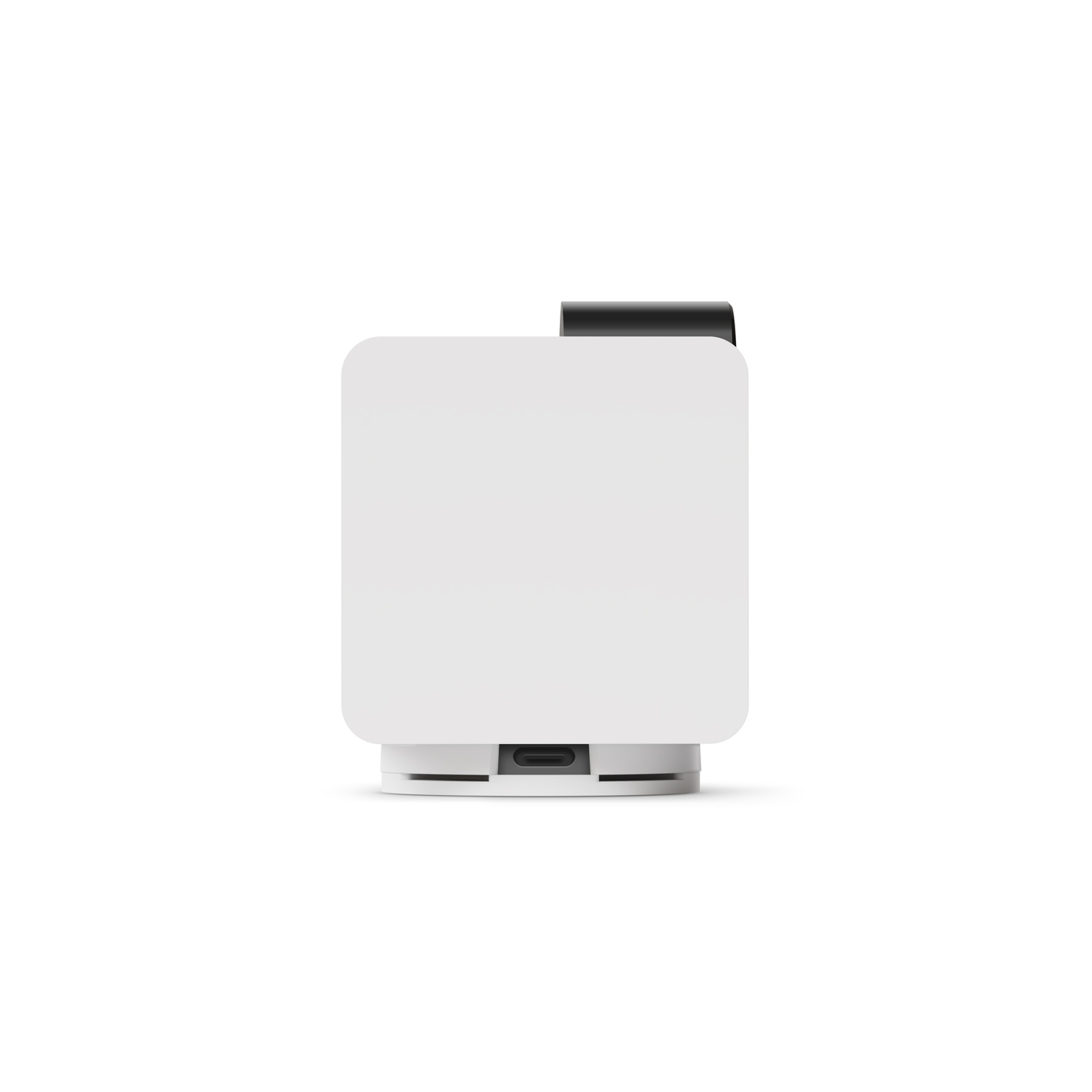 A small white device with a black top, with a USB port on the bottom.