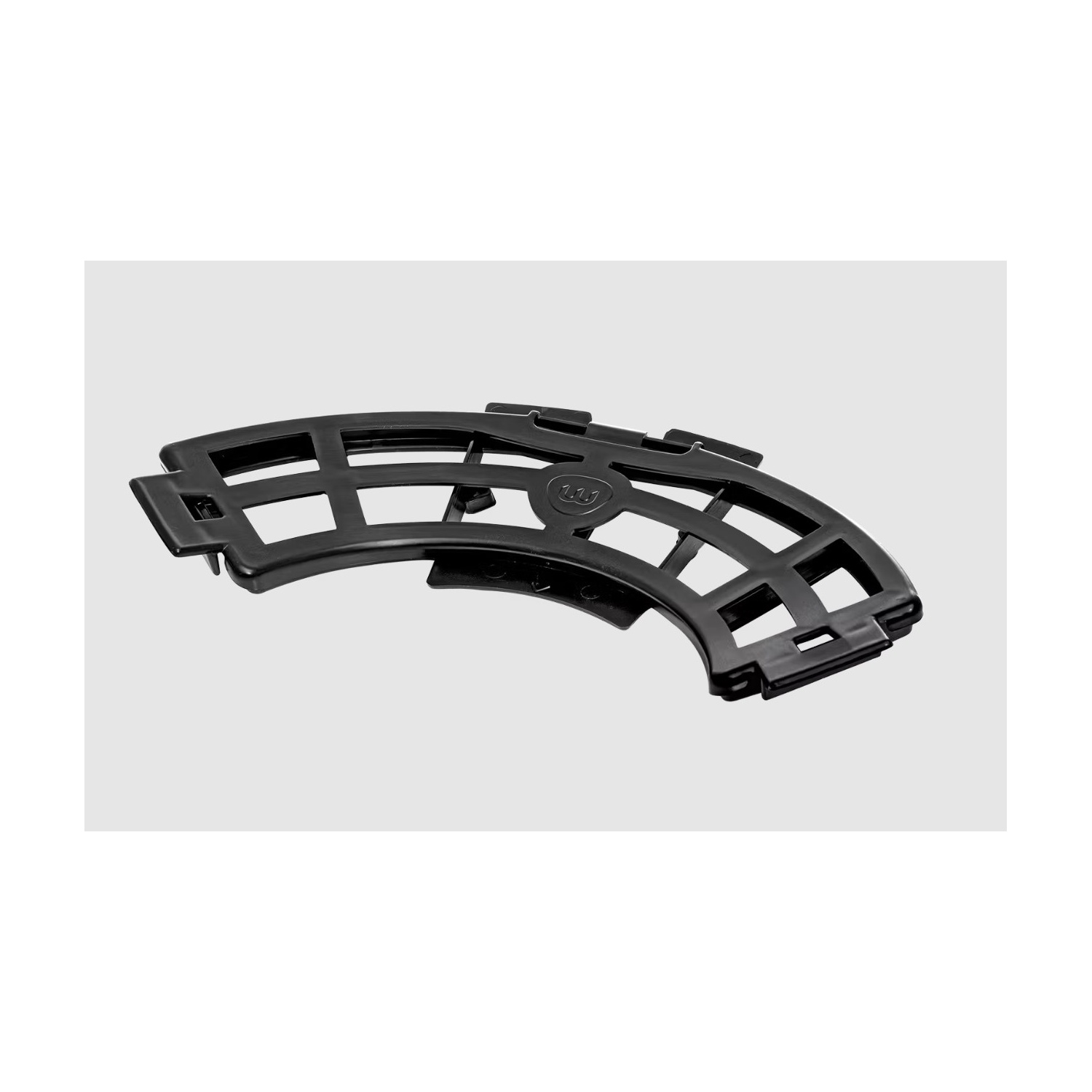A black plastic corner piece with a grid-like design, on a light gray background.