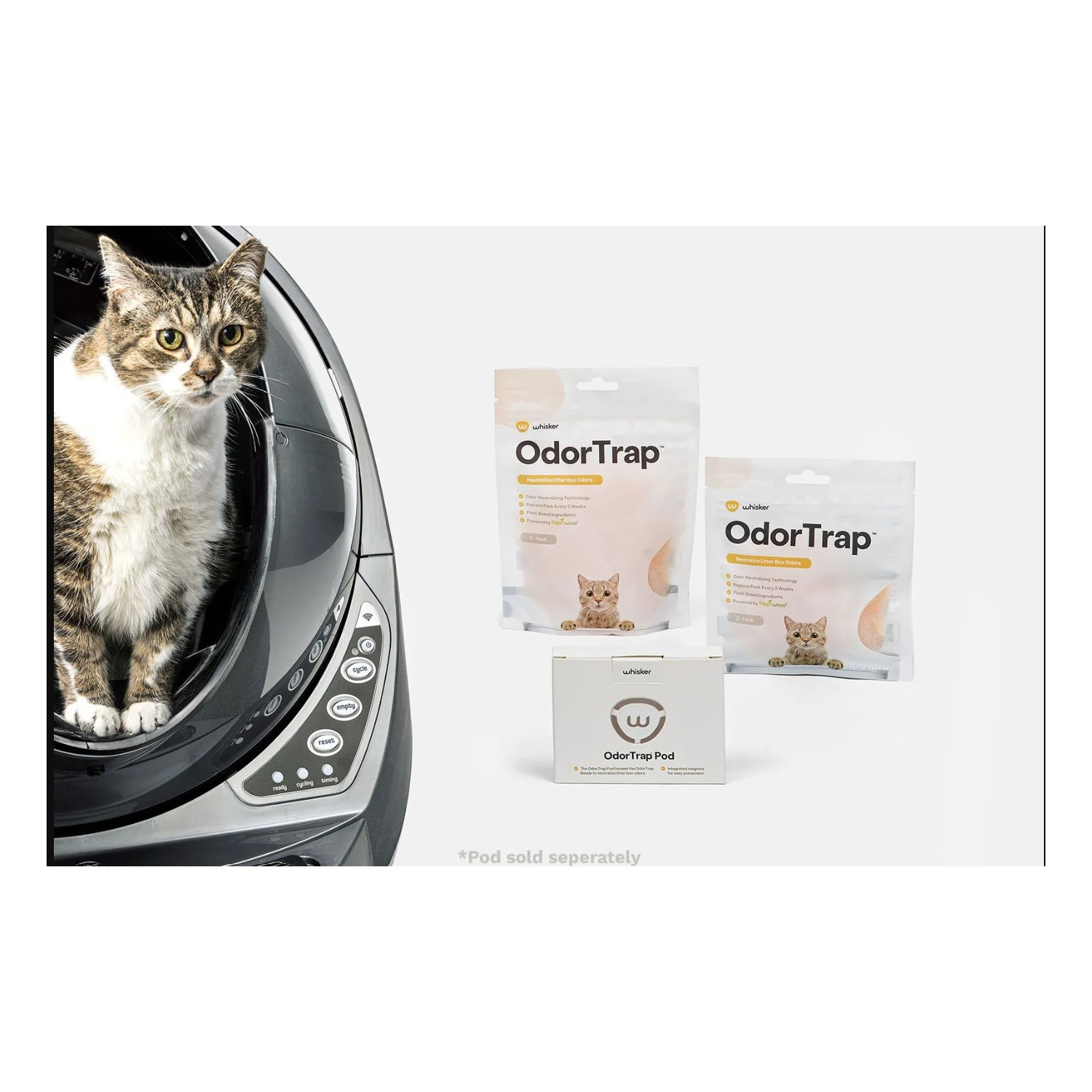 A cat in a litter box next to odor trap products.