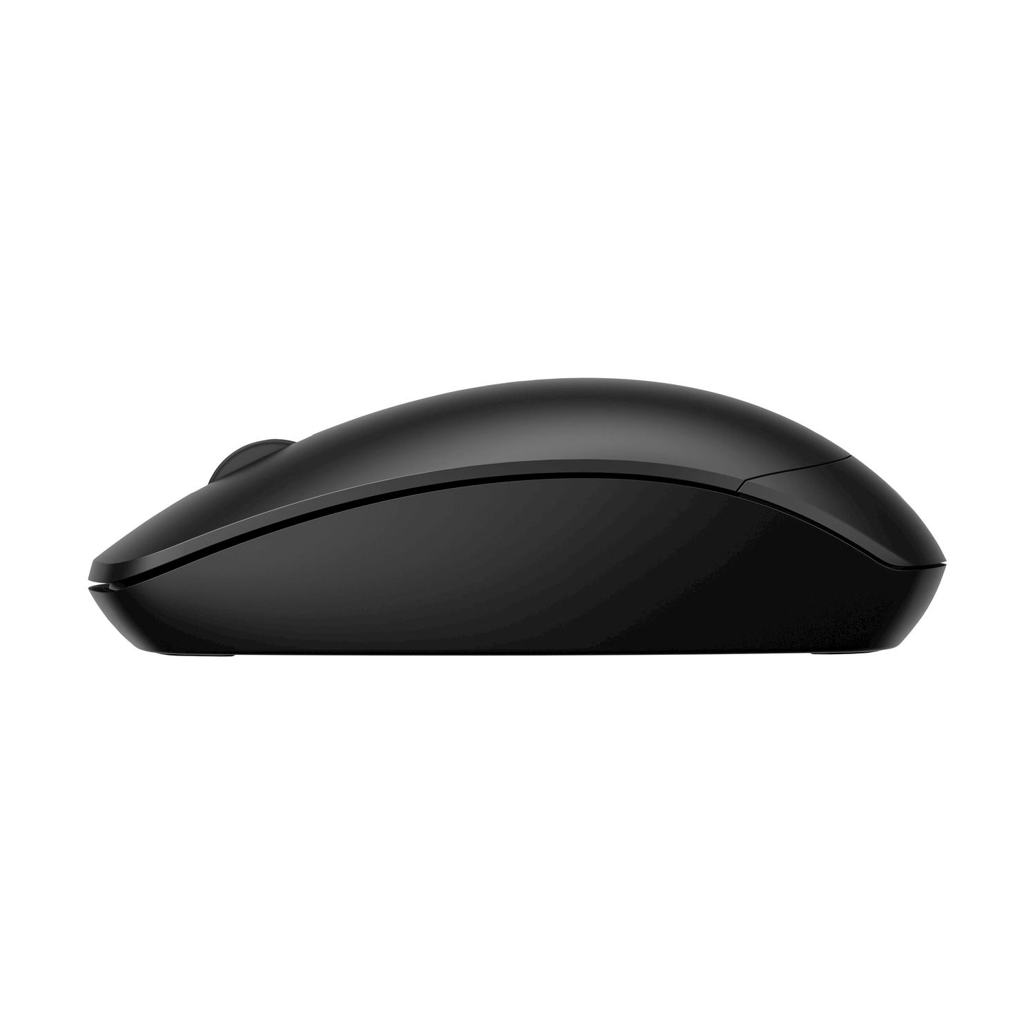 Una vista laterale di un mouse nero per computer su sfondo bianco.