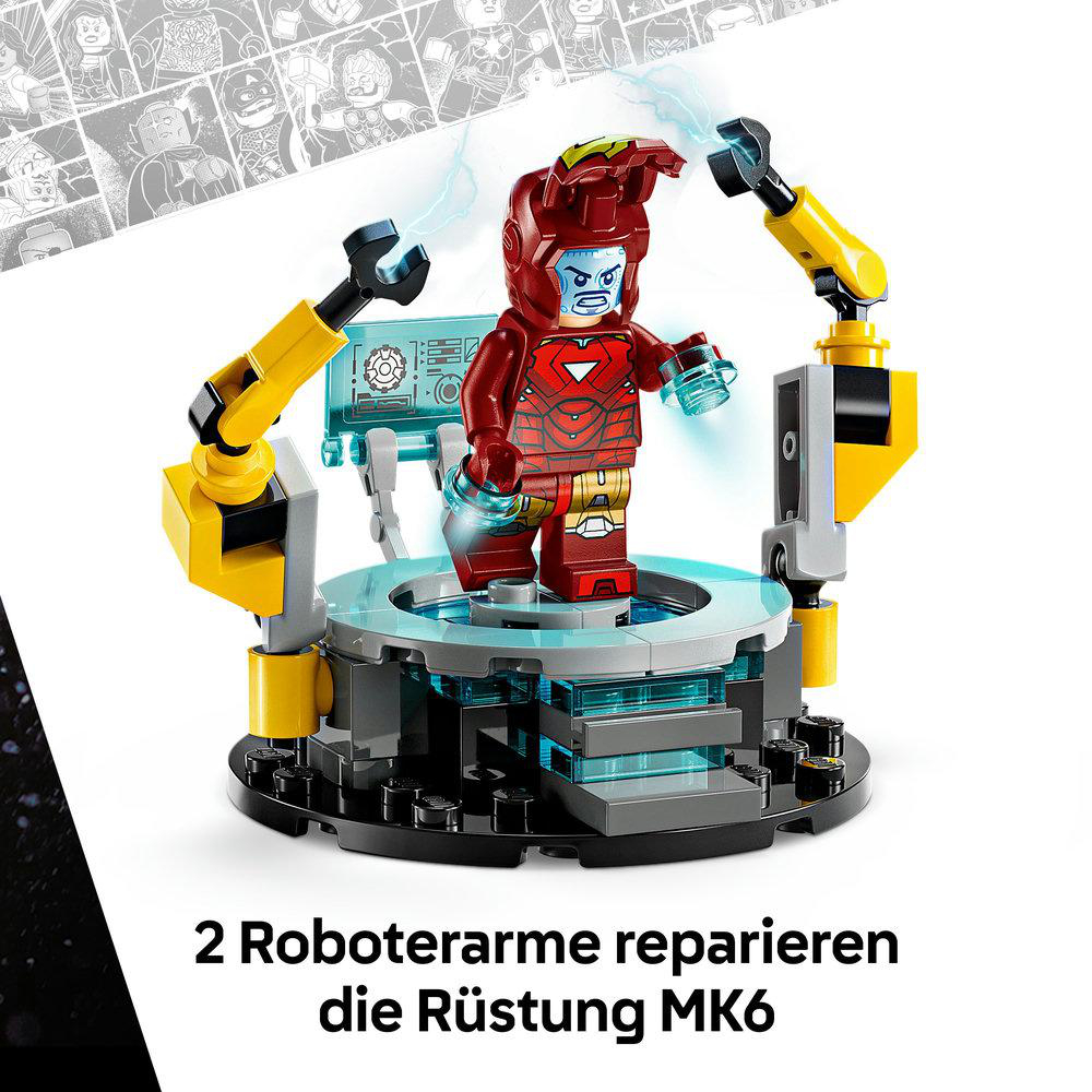 Lego Iron Man Figur, die von Roboterarmen auf einer Plattform repariert wird.