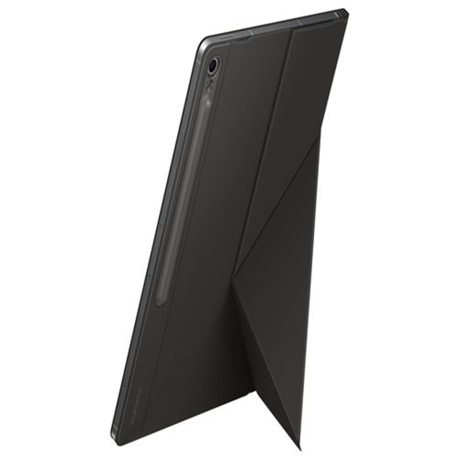 A black tablet with a stand-like cover, angled on a black surface.