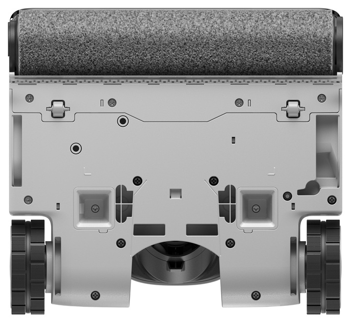 Widok od spodu białego i szarego robota odkurzającego z czarnymi kołami i wałkiem.
