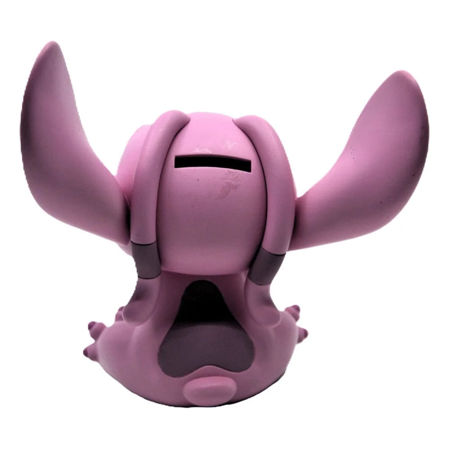 Pink Angel piggy bank with a coin slot on the back. It has large ears, closed eyes, and a small tail.