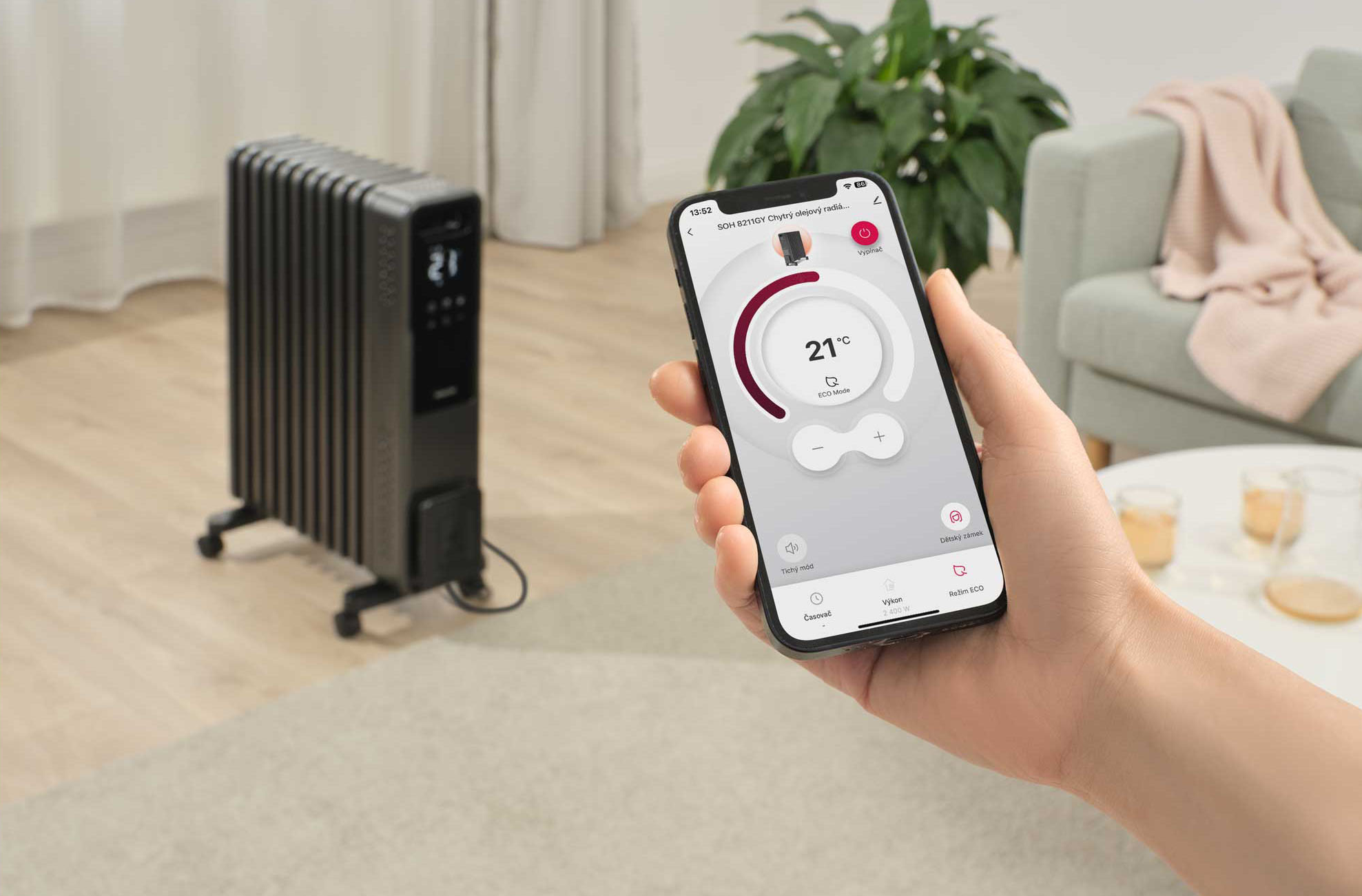 Fekete elektromos fűtőtest digitális kijelzővel, telefonnal vezérelve.