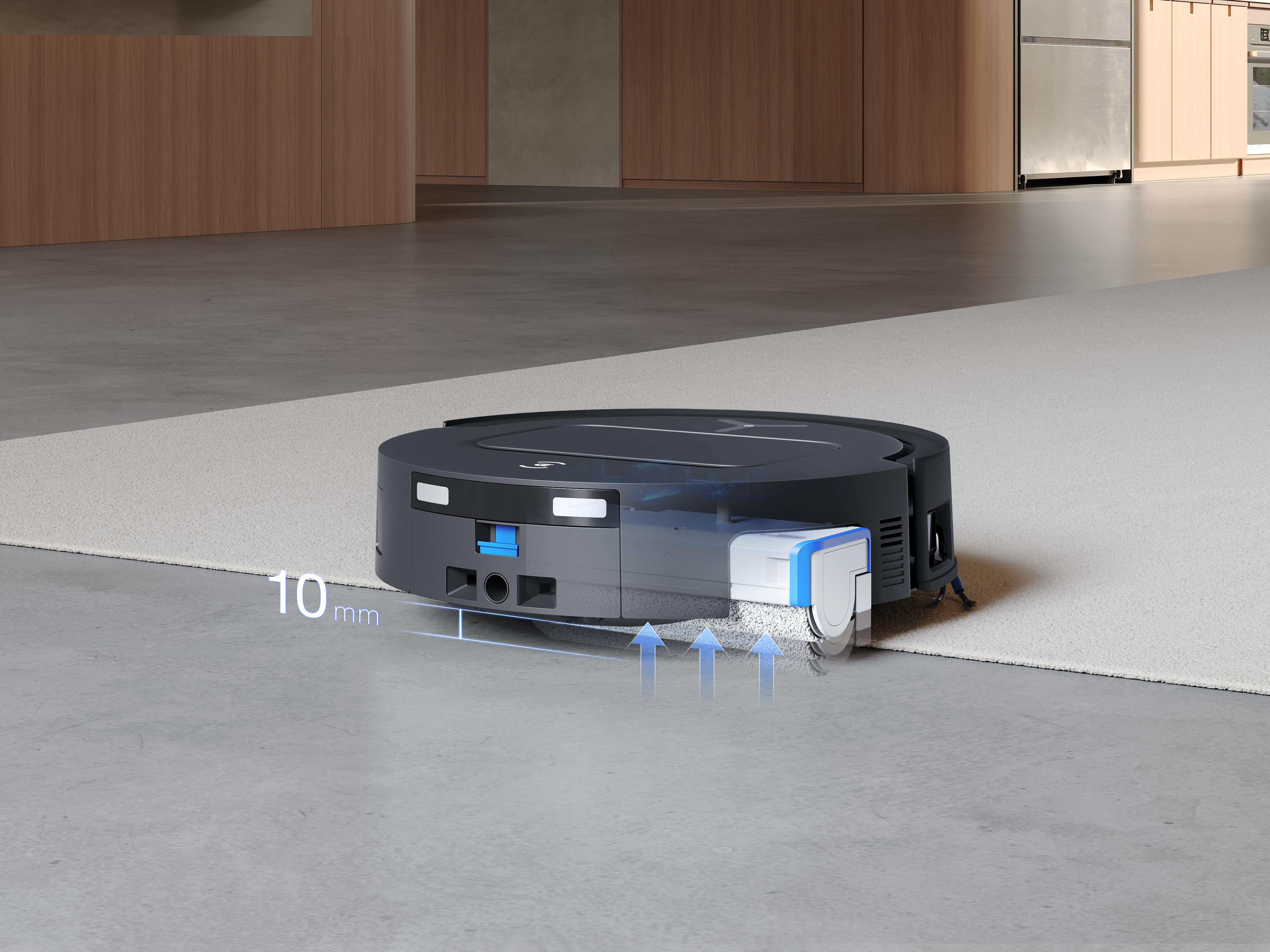 Ein Roboter-Staubsauger auf einem Teppich.