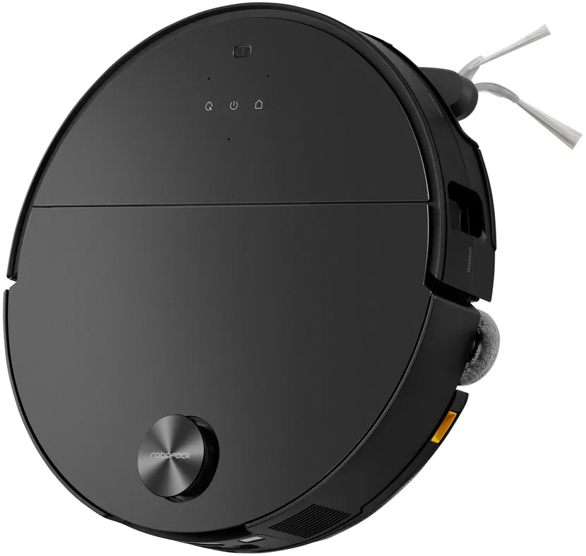 Un aspirapolvere robot rotondo e nero. La scena è una vista dall'alto.