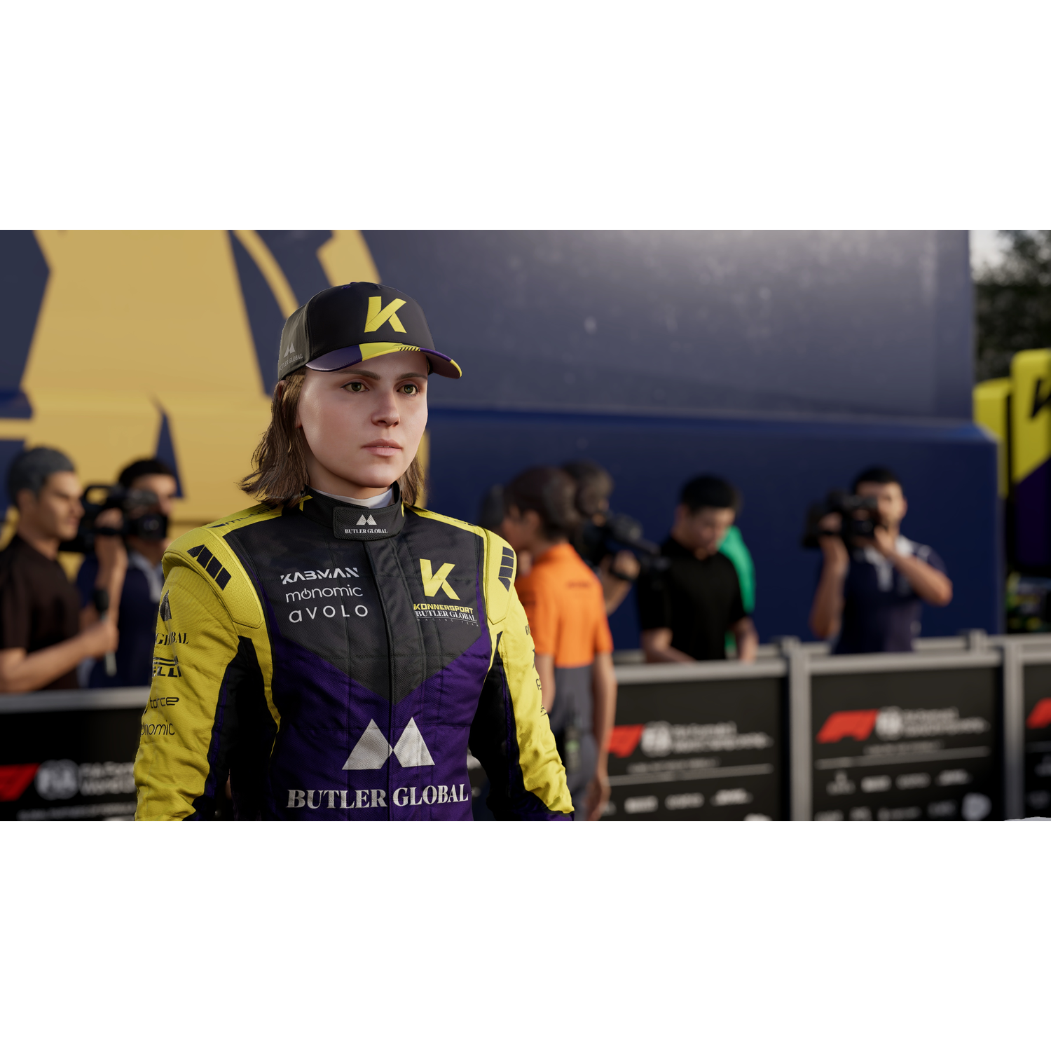 Woman in racing suit with a cap, standing with a blurred background of people and a track banner.