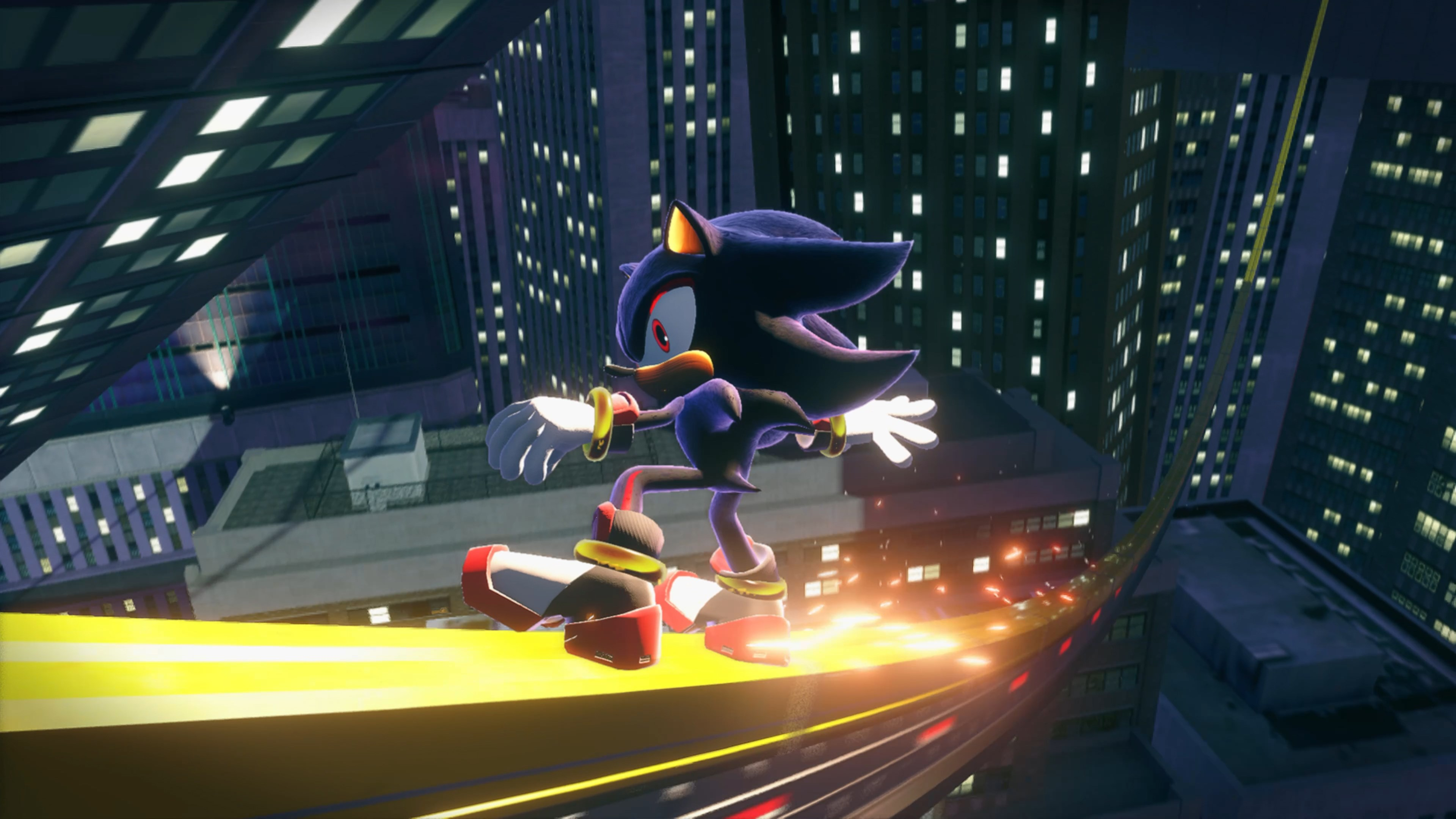 Sonic the Hedgehog corre su una pista in una città notturna, illuminato da luci al neon.
