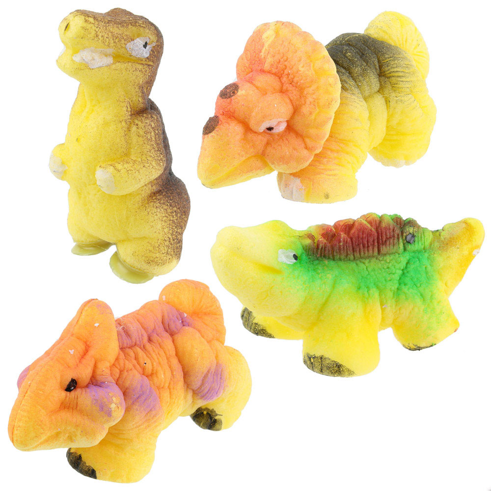 Cuatro juguetes de dinosaurios coloridos sobre un fondo blanco. Cada uno tiene un diseño único.