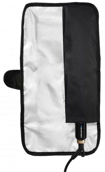 Czarno-białe etui na urządzenie. W środku kabel do ładowania i urządzenie. Dominują kolory czarny i biały.