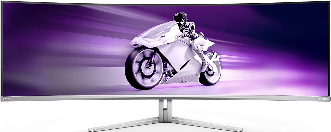Écran d'ordinateur incurvé affichant une moto. Le moniteur est argenté. Le fond est violet.
